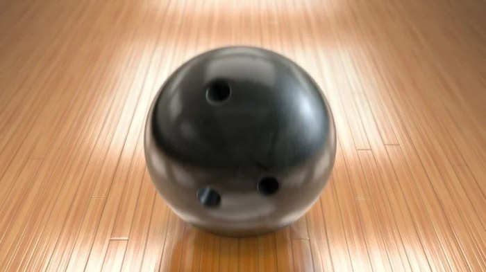 An 8-kilogram bowling ball is rolling in